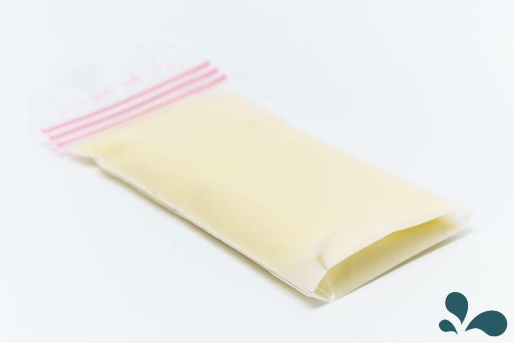 A single sealed breastmilk storage bag ready for refrigeration or freezing, symbolizing the careful preservation of mother's milk.