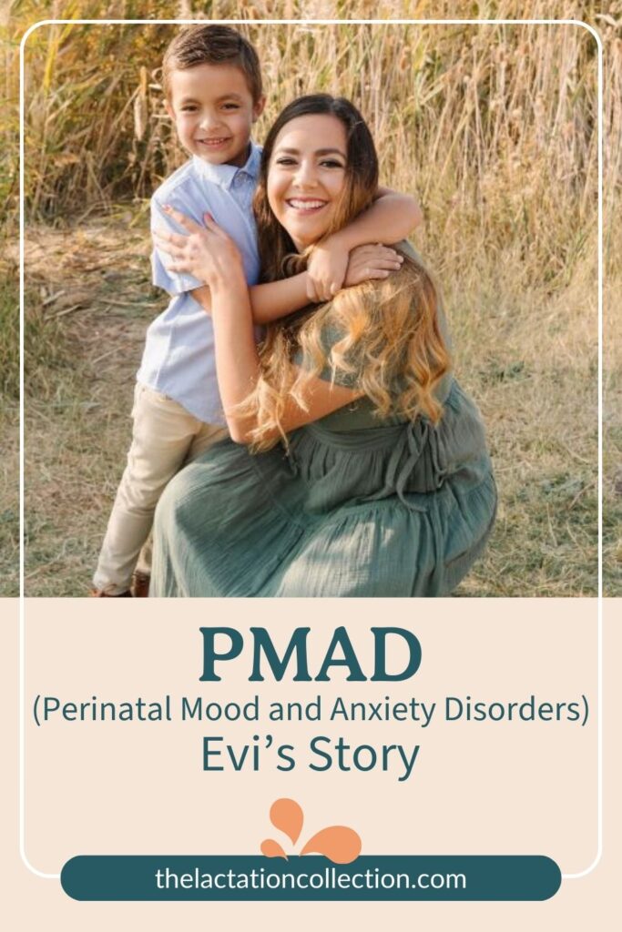 A joyous mother in a flowing green dress warmly embraces her young son, who wears a light blue shirt and khaki pants. Both are smiling broadly, radiating happiness and love in an outdoor setting with tall grasses in the background. The text 'PMAD (Perinatal Mood and Anxiety Disorders) Evi’s Story' overlays the bottom portion of the image, inviting readers to learn more about this personal story.
