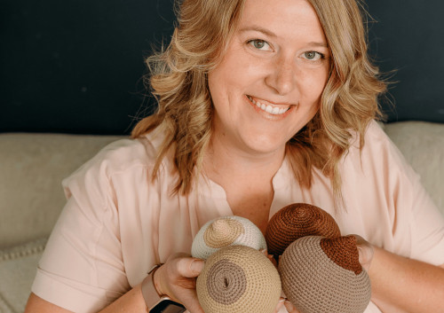 Anna with props for the breastfeeding course