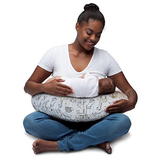 breastfeeding mother using a boppy pillow to nurse baby